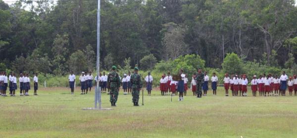 Satgas Pamtas RI-PNG Yonif 407/Padmakusuma Upacara Hari Kesaktian Pancasila Bersama Para Pelajar